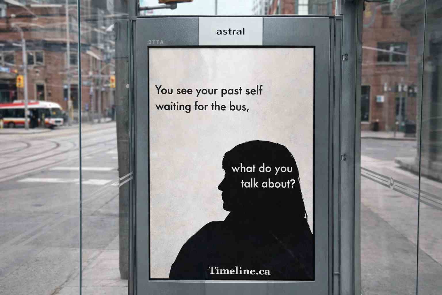 a mockup of an ad at a bus stop that reads 'you see your past self waiting for the bus, what do you talk about?'