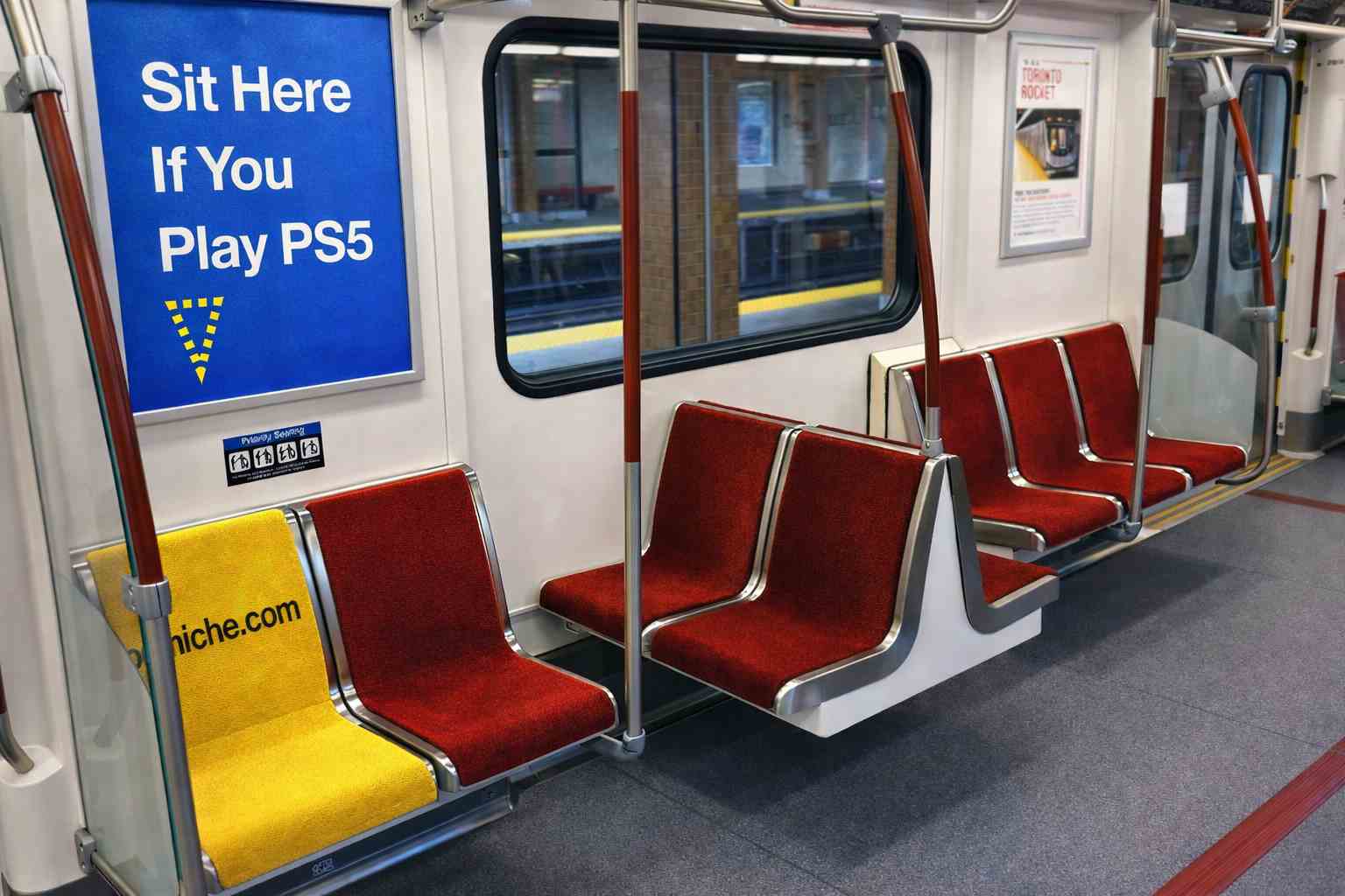 a mockup of an ad on the subway that points to a chair and reads 'sit here if you play ps5'